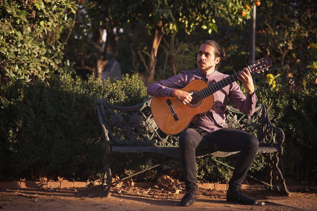 Me playing guitar in Granada, Spain